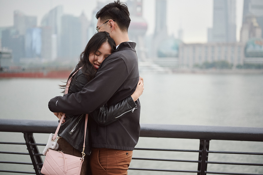 Bryan embracing Hong Yun after she accepts his marriage proposal on the Bund.
