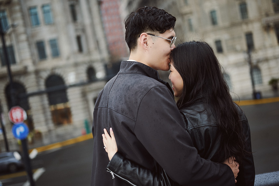 A candid portrait of the newly engaged couple beneath the overcast Shanghai sky.