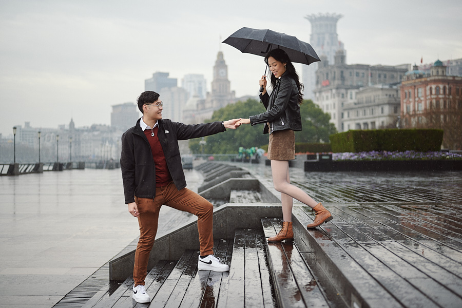Candid engagement photography on the quieter side of the Bund in Shanghai.